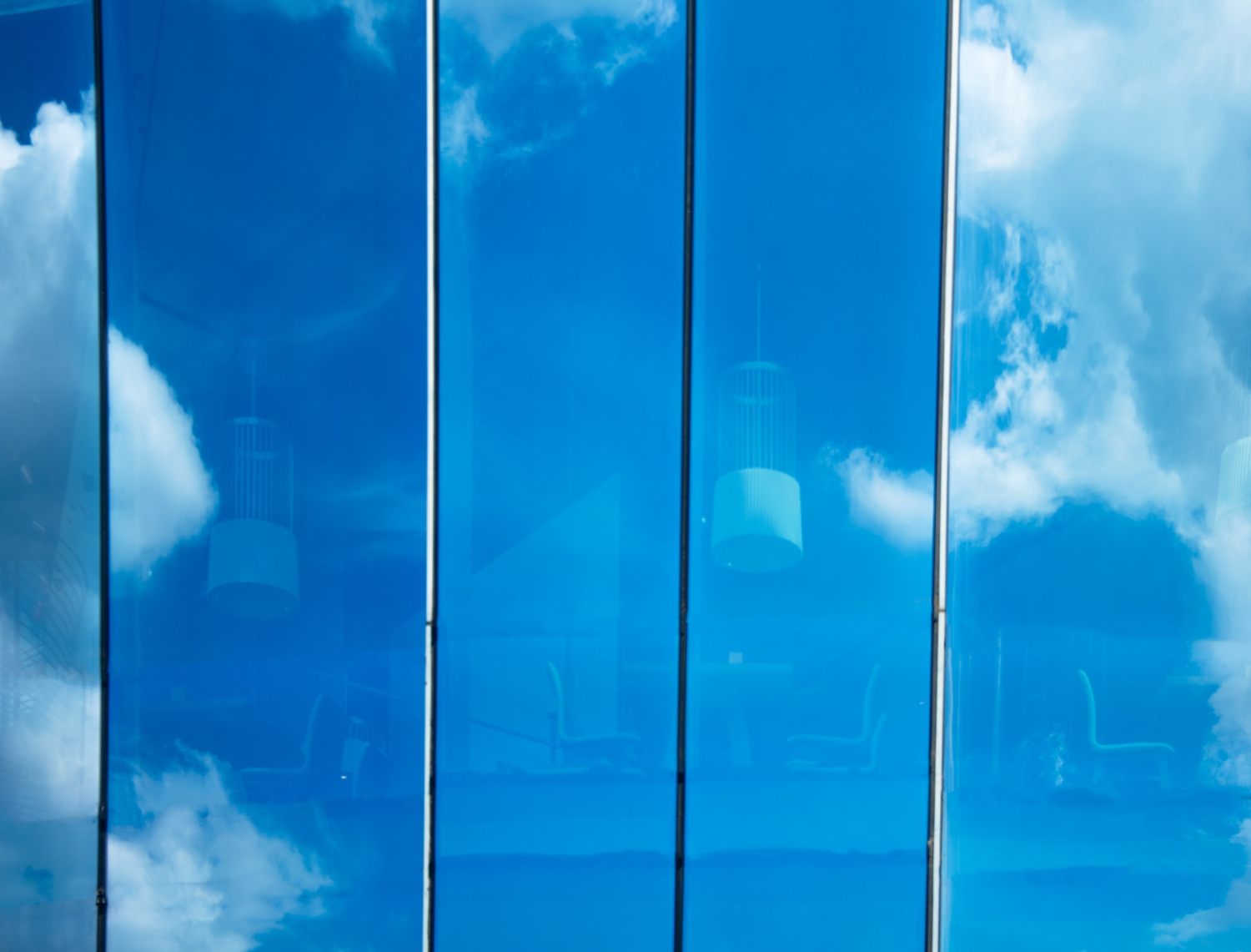Blue architectural glass panels representing laminated glass selection