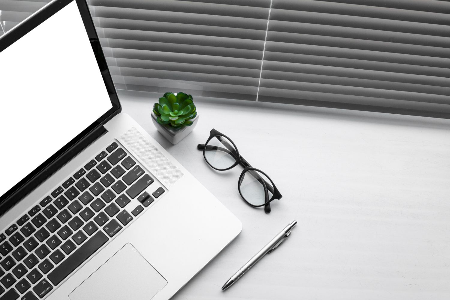 Premium silver business laptop in a professional workspace